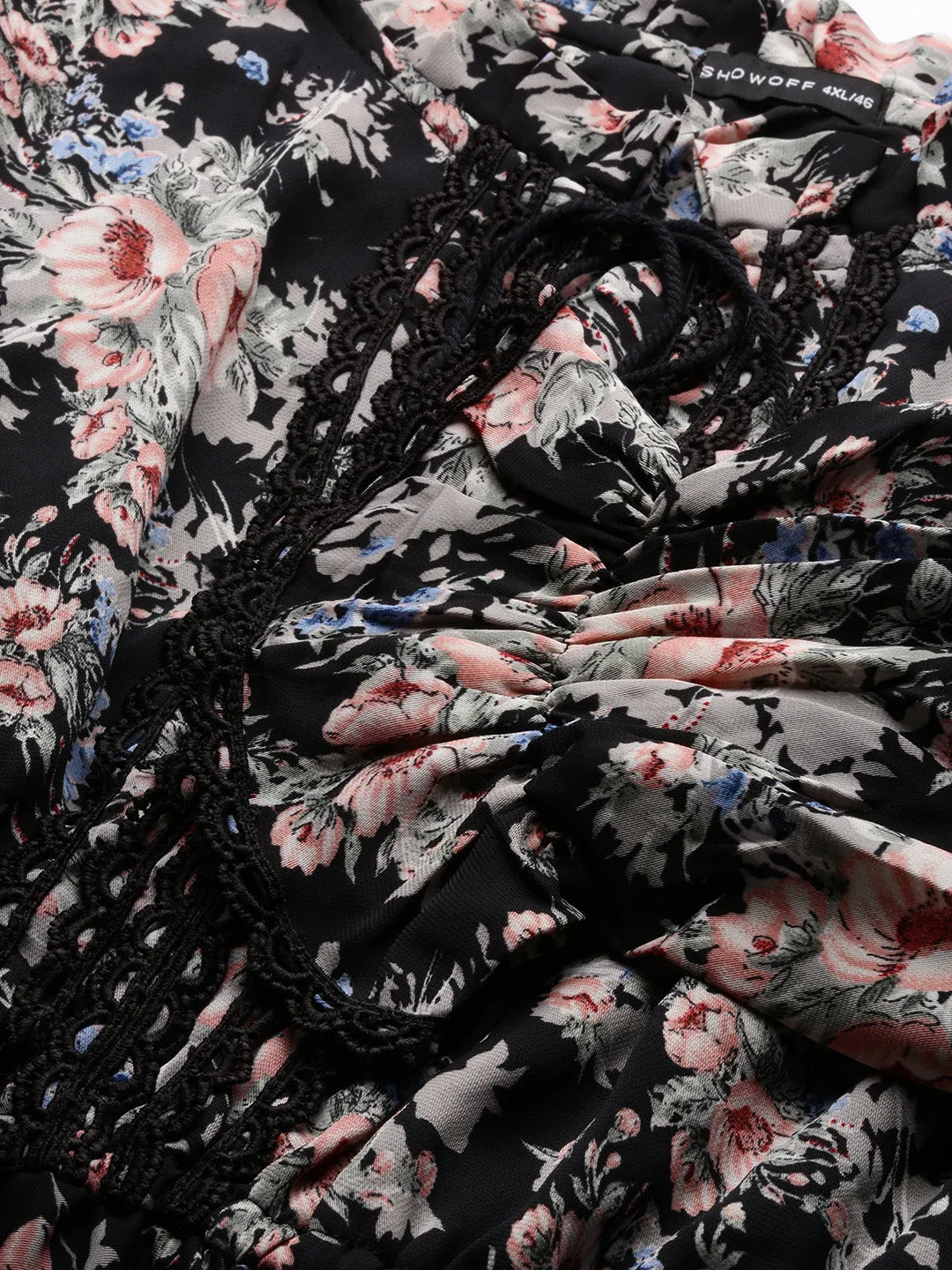 Women Black Floral Printed Tie-Up Neck Puff Sleeve Crepe Peplum Top