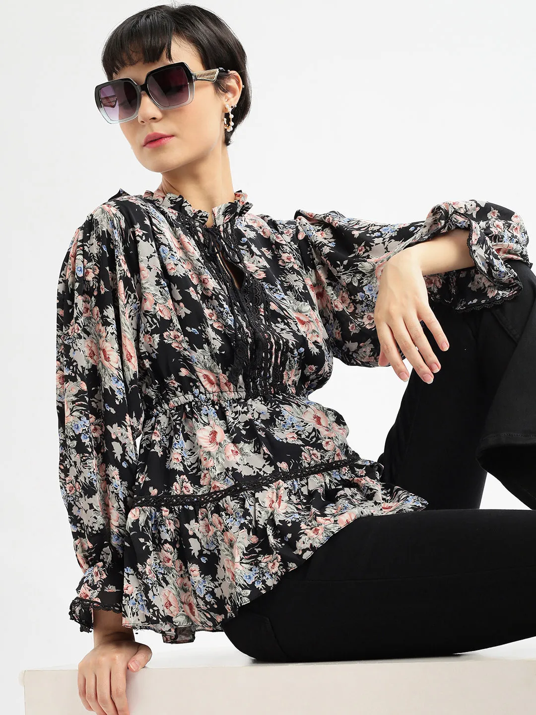 Women Black Floral Printed Tie-Up Neck Puff Sleeve Crepe Peplum Top