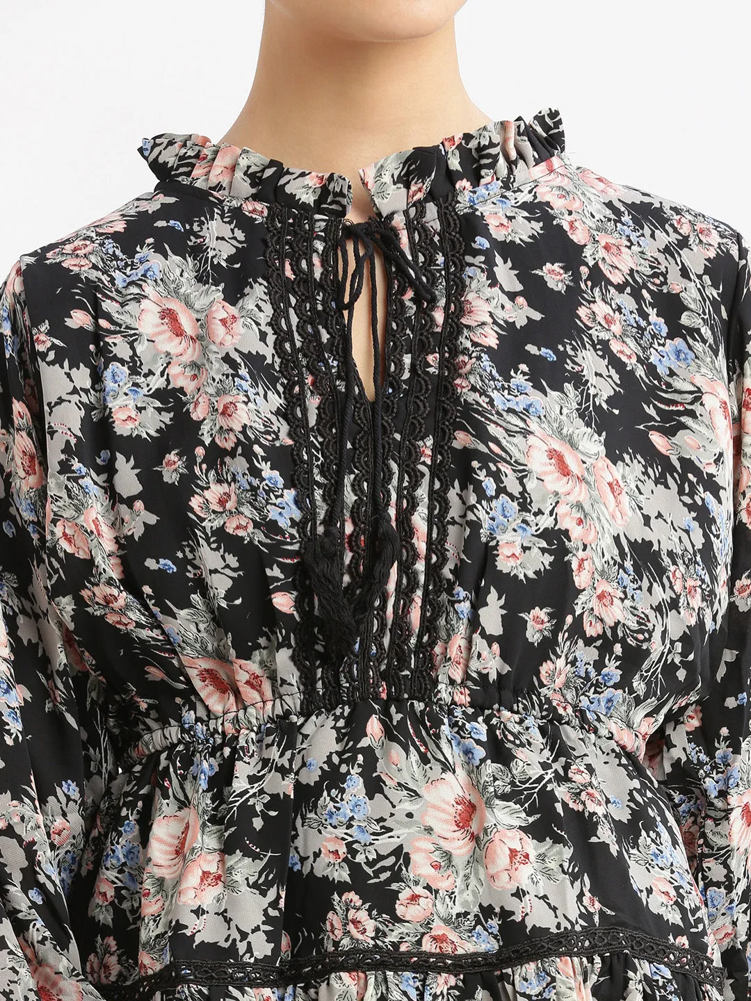 Women Black Floral Printed Tie-Up Neck Puff Sleeve Crepe Peplum Top